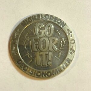 Vintage 90s Nickelodeon coin